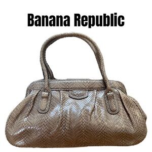 Banana Republic Leather handbag with reptilian pattern.